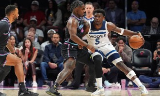 爱德华兹33分鲍威尔21分 热火不敌森林狼